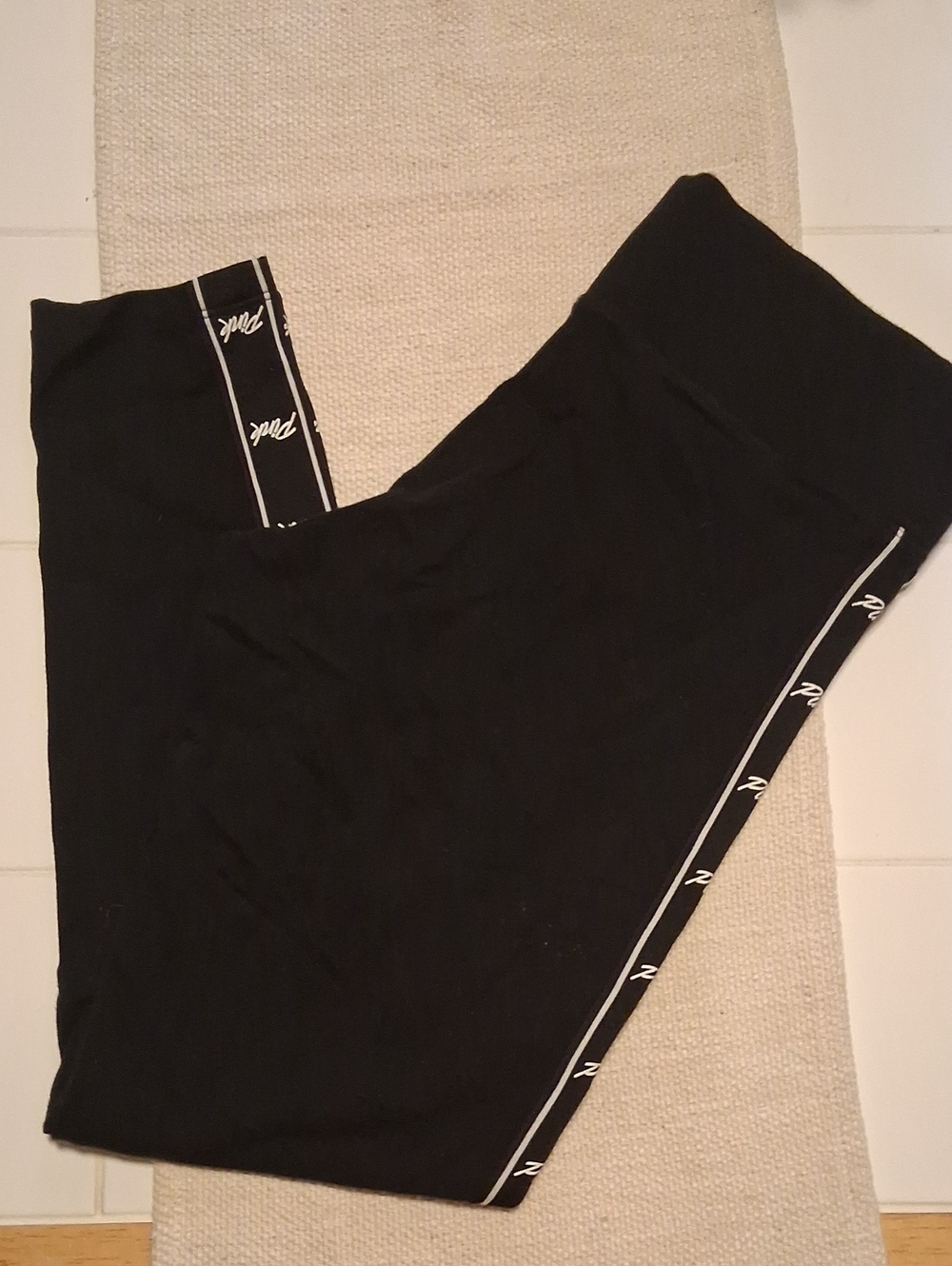 Used PINK Victoria's Secret Black Leggings With Pink Going Down Leg Size Large